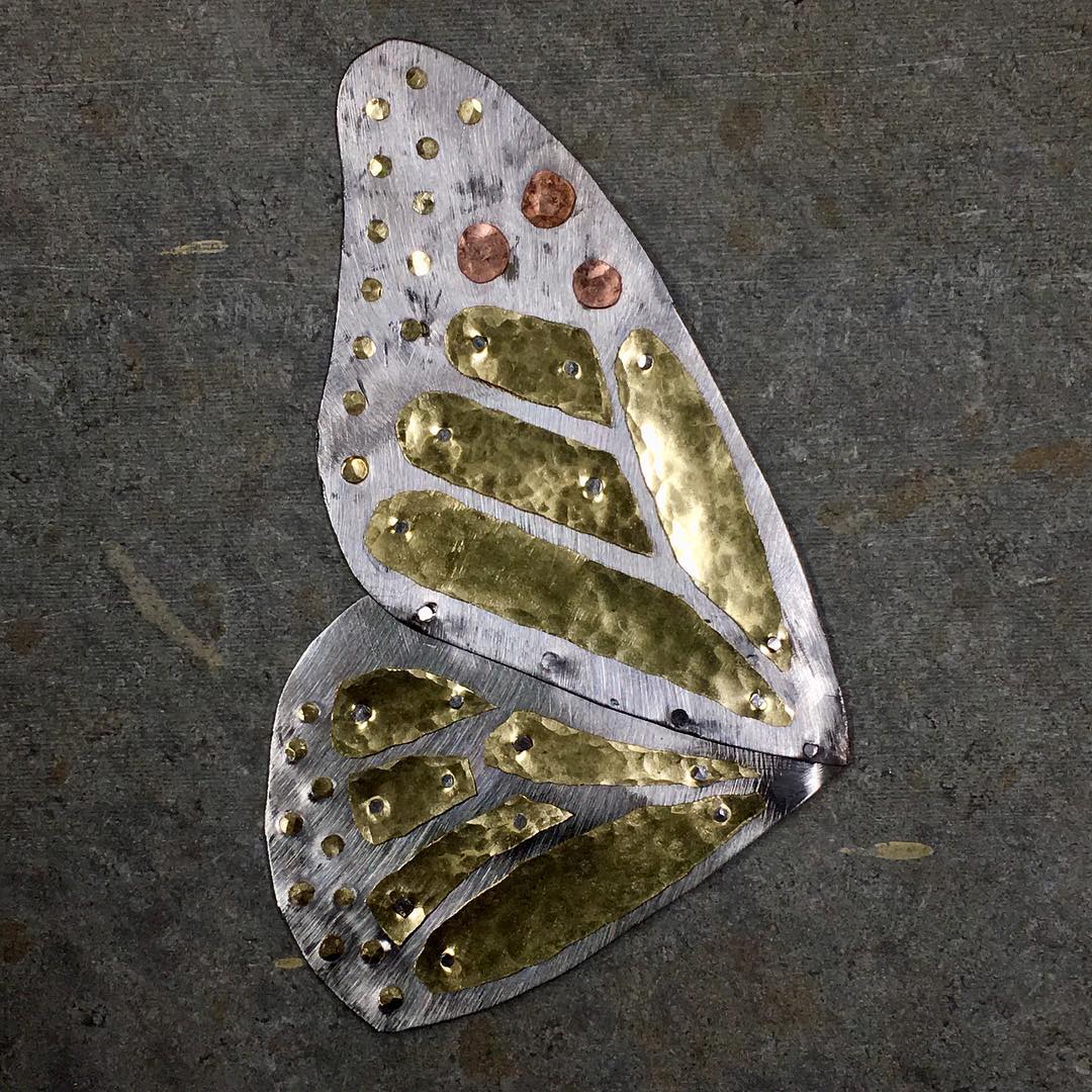 Forged butterfly wing in steel, brass, and copper